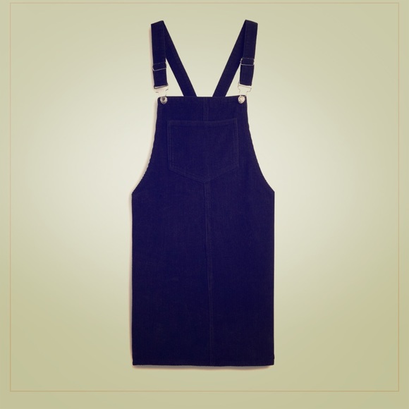 Overalls, however in a pink/purplish color. - Picture 1 of 1